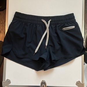 Vuori navy blue running shorts